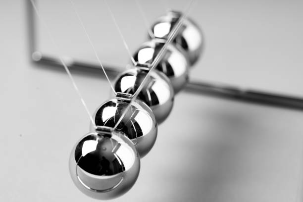 istock Newtons Cradle balancing balls, business concept in studio 1071461318