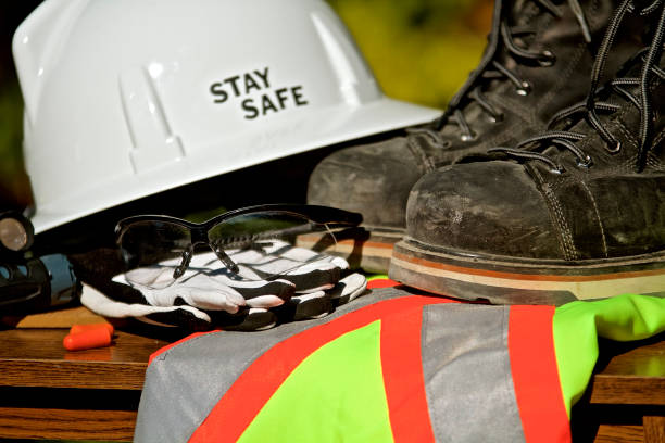 Safety Personal Protection Equipment Safety Personal Protection Equipment including hardhat, gloves, protective glasses occupational safety and health stock pictures, royalty-free photos & images