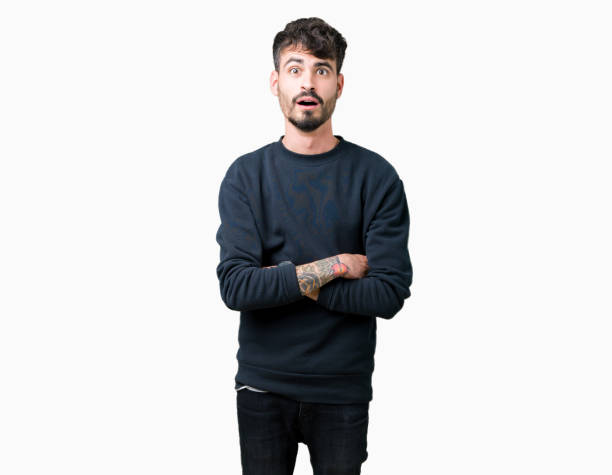 istock Young handsome man over isolated background afraid and shocked with surprise expression, fear and excited face. 1071468686