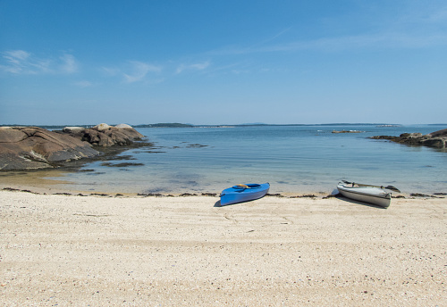 Kayaks on a secret Maine beach