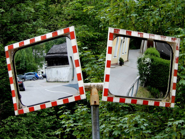 istock Two traffic mirrors in front of forest 1071470504