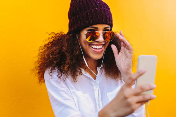istock Stylish african woman doing a video chat 1071470614