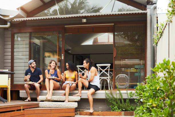 istock Friends enjoying a bbq in a home patio. 1071482632