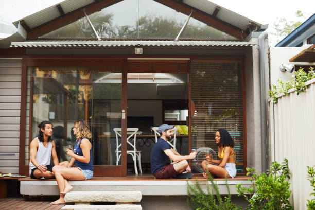 istock Friends enjoying a bbq in a home patio. 1071482638