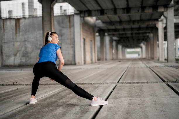 istock Women athlete stretching 1071494646