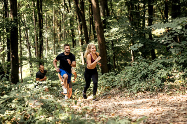 istock Friends running in the nature 1071495224