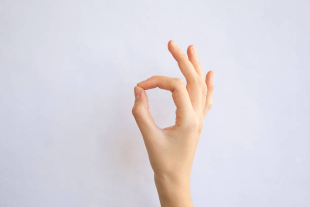 istock woman show hand sign 1071498810
