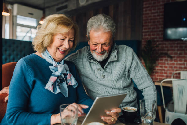 istock Couple looking at digital tablet 1071506118