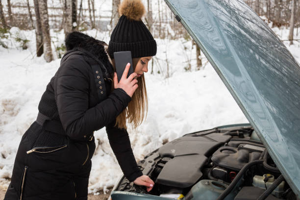 istock Woman Calling for help, her car broke! 1071506882