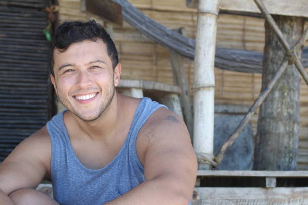 Handsome man smiling in summer look.