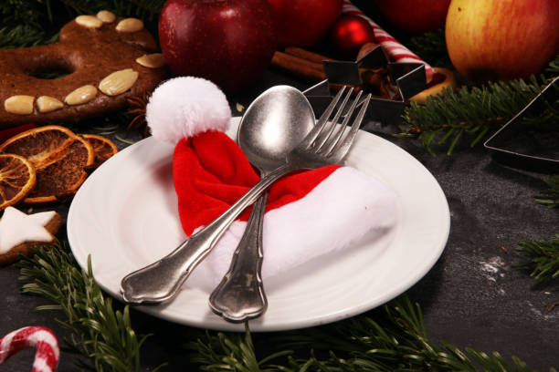istock Festive table setting for xmas with fork, knife, nuts and apples a christmas dish concept 1071509668