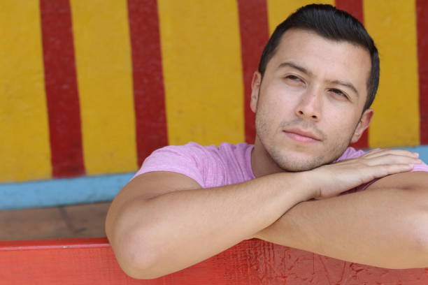 istock Thoughtful man leaning on a fence 1071511504