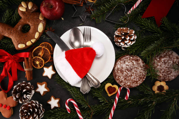 istock Festive table setting for xmas with fork, knife, nuts and apples a christmas dish concept 1071512748