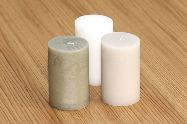 istock Candles on wooden table 1071512882