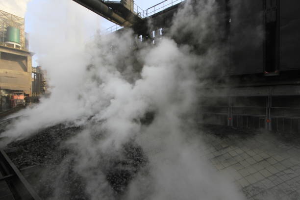 istock Iron and steel factory and workers working. 1071513156