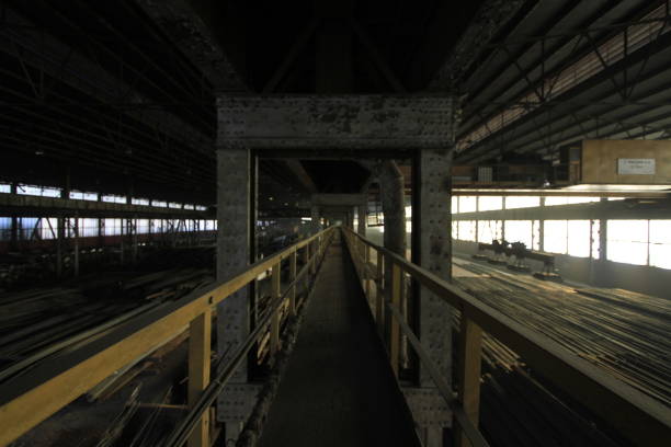 istock Iron and steel factory and workers working. 1071514866