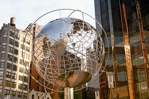 New York, USA - June 22, 2016. The Globe Sculpture in front of Trump International Hotel and Tower at 1 Central Park West, New York City, USA