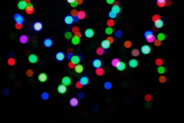 istock festive abstract defocused led lights on black background 1071520664