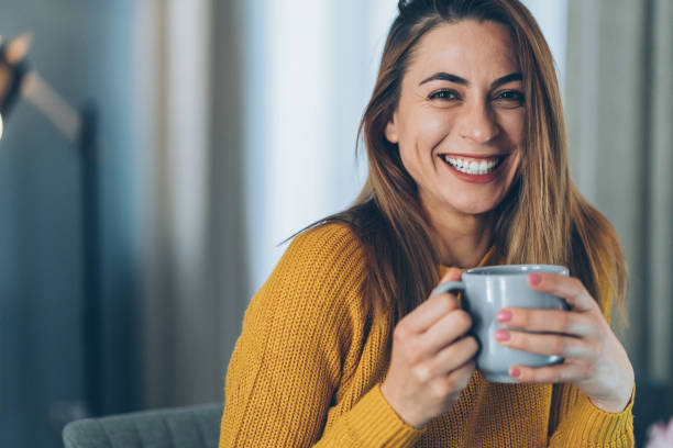 istock Woman with coffee 1071543422