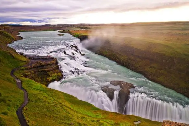 The immense power and grandeur of Gullfoss Waterfall in Iceland exhibits different moods.