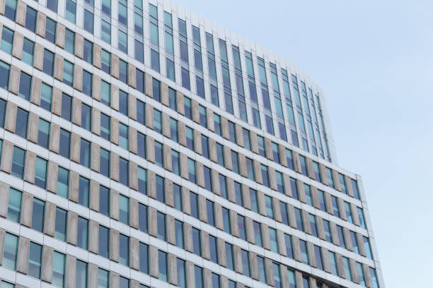 istock Modern office building against clear blue sky 1071562024