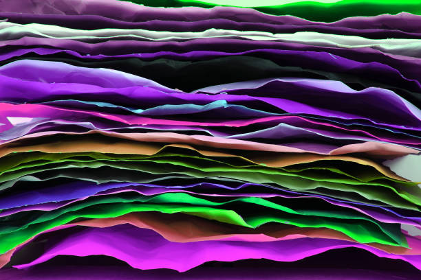 istock crumpled color papers background 1071562174