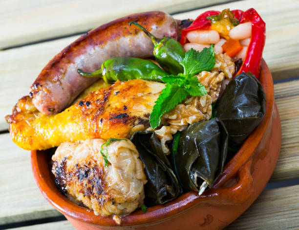 istock Kapama with grilled sausage, grape rolls, stuffed pepper and fried chicken 1071576174