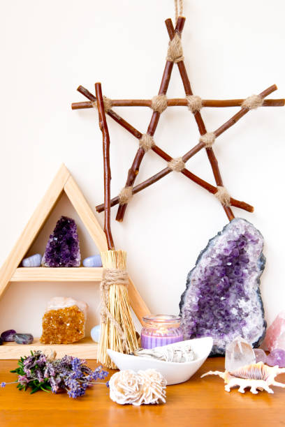 istock Spiritual Altar space with crystal stand, crystals, smudge stick and plain besom 1071579666