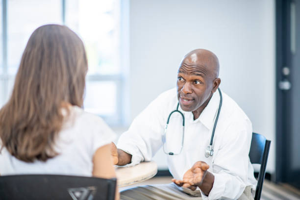 istock Doctor Talking to Patient 1071580874