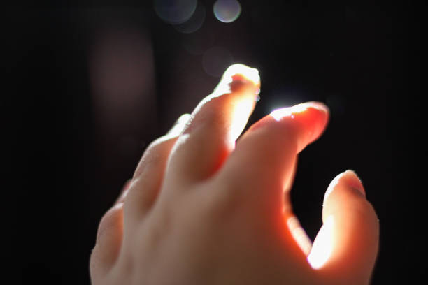 a low angle view of a hand