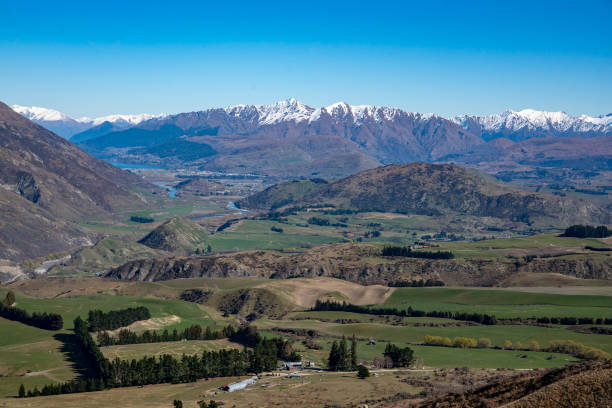 istock Ski fields in the snow capped mountains and valley 1071588418