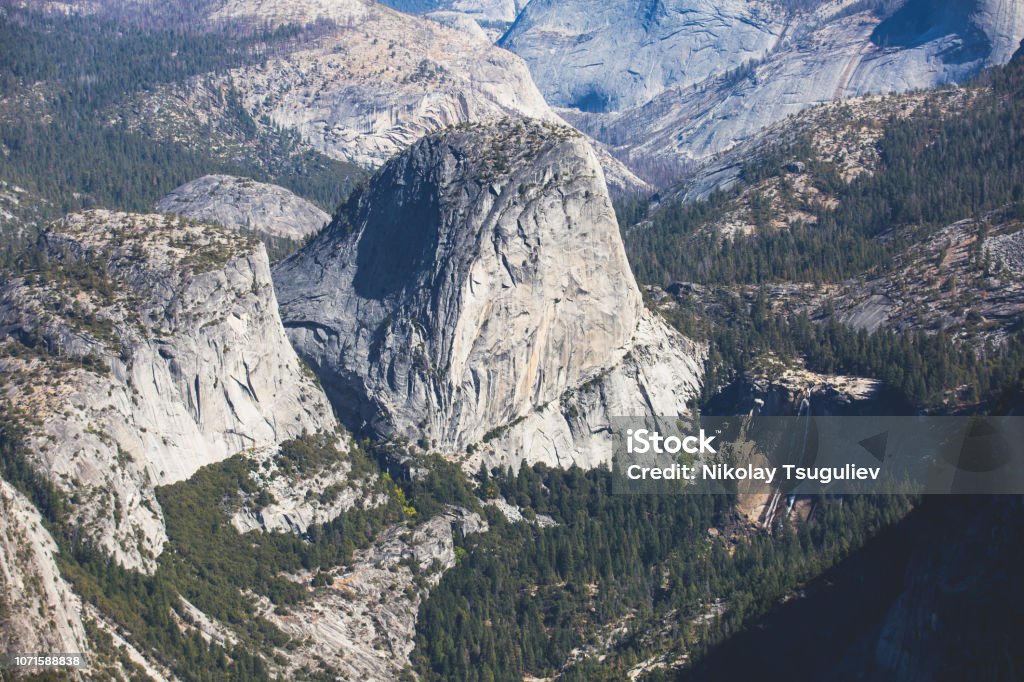 Panoramic summer view of Yosemite valley with Half Dome mountain, Tenaya Canyon, Liberty Cap, Vernal Fall and Nevada Fall, seen from Glacier point overlook, Yosemite National Park, California Panoramic summer view of Yosemite valley with Half Dome mountain, Tenaya Canyon, Liberty Cap, Vernal Fall and Nevada Fall, seen from Glacier point overlook, Yosemite National Park, California"n Architectural Dome Stock Photo