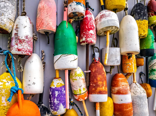 Lobster buoys on wall in Maine