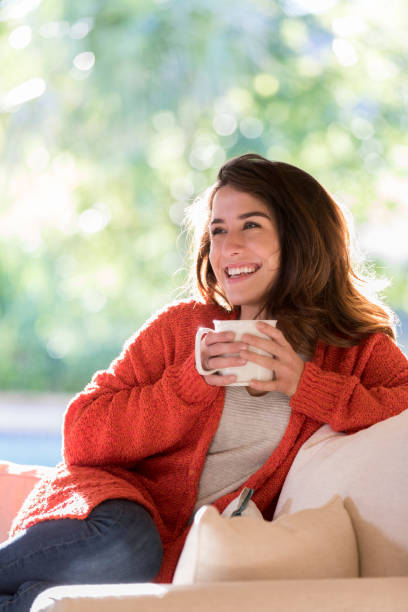 istock Day dreaming young woman 1071595182