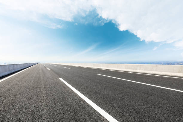 istock Panoramic city skyline and buildings with empty road 1071600994