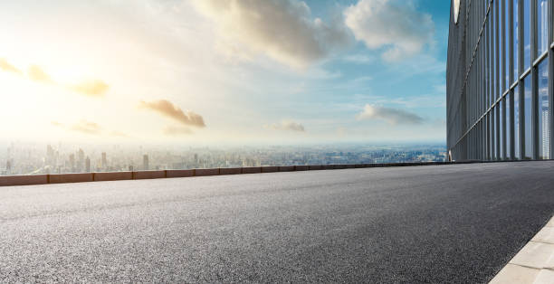 istock Panoramic city skyline and buildings with empty road 1071603644
