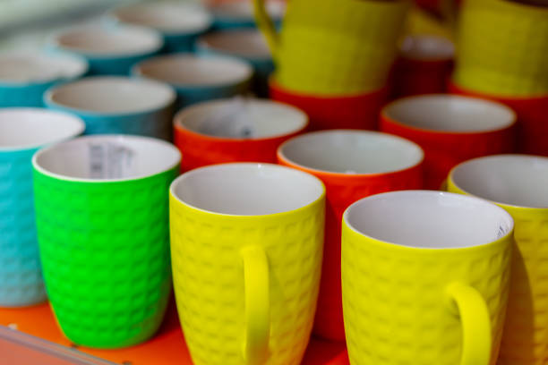 istock Many colored mugs in the store 1071618312