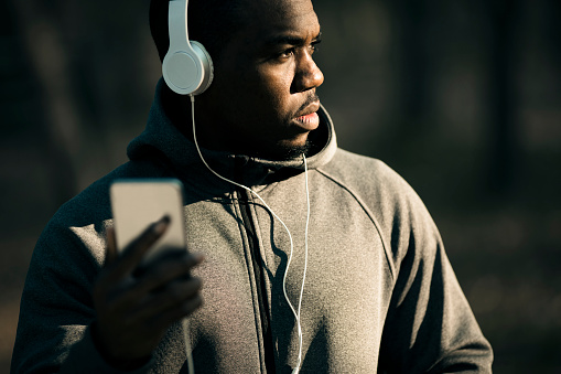 Close up of a young man listening to music