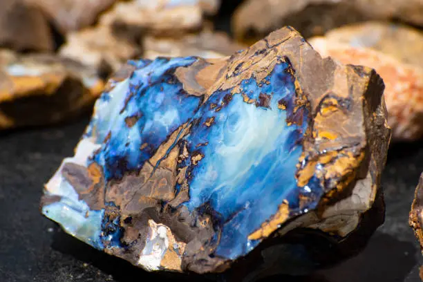 Australian Opal. Typical Australian gemstone in rock.