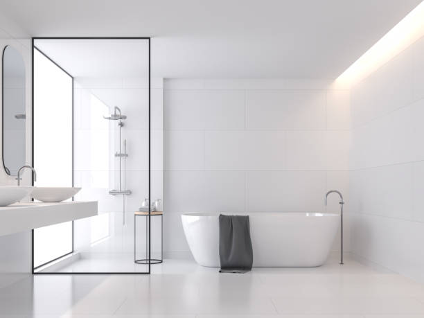 Minimal style white bathroom 3d render Minimal style white bathroom 3d render, There are large white tile wall and floor.There have glass partition for shower zone,The room has large windows.Natural light transmitted through the room. bathroom stock pictures, royalty-free photos & images
