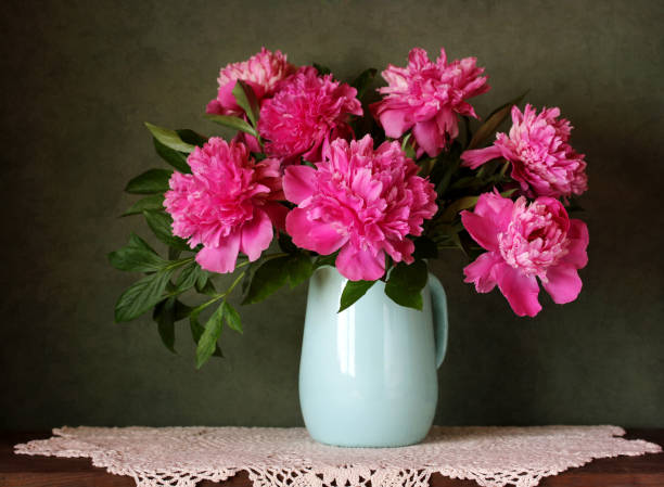 istock Pink peonies in a jug. 1071657196