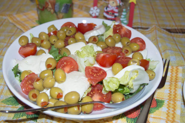 istock Fresh Greek salad on a white plate 1071663548