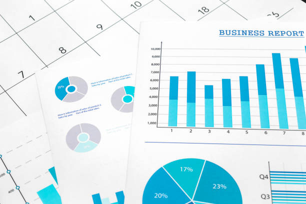 Financial graphs on the calendar. Business concept.