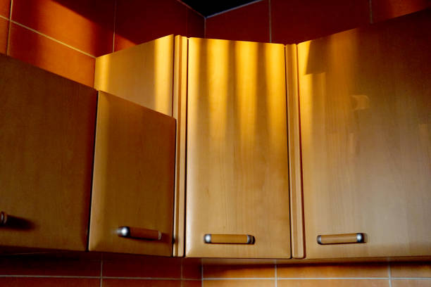 istock kitchen cabinets in the rays of the setting sun 1071674136