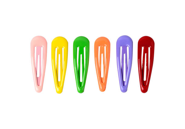 istock Colored hair clips isolated on white background 1071678772