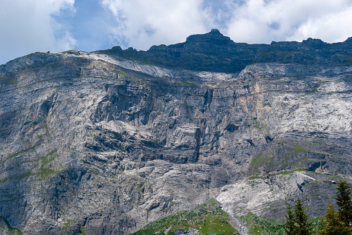 Crisp white cornices and sparkling snow at the summit of Helvellyn, Lake District, UK, overlooking the peaks and ridges, valleys and golden hillsides of the Eastern Fells in this very large and detailed picturesque panoramic vista. ProPhoto RGB profile for maximum color fidelity and gamut.