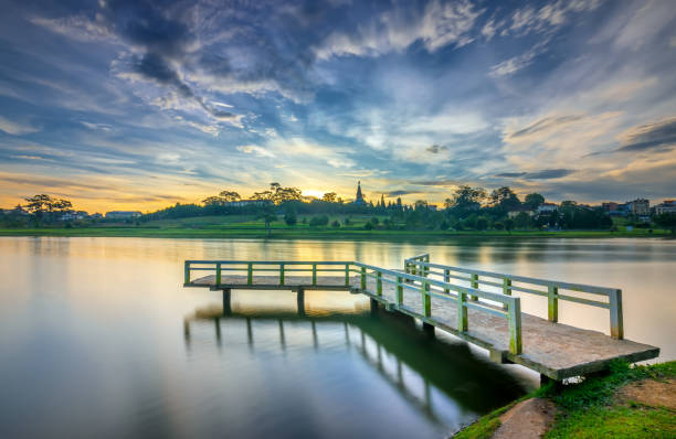 istock Sunrise on the small bridge overlooking the lake with the dramatic sky 1071685474