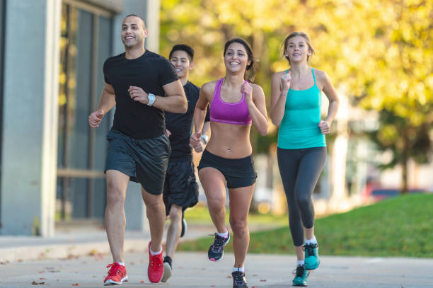 istock Friends running in autumn 1071687668