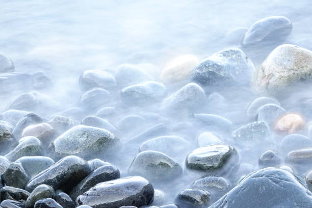 istock Pebbles in the sea vh545 1071694662