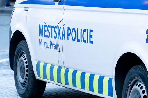Part of the side and the signs on a White State Police Car from Prague, The Czech Republic